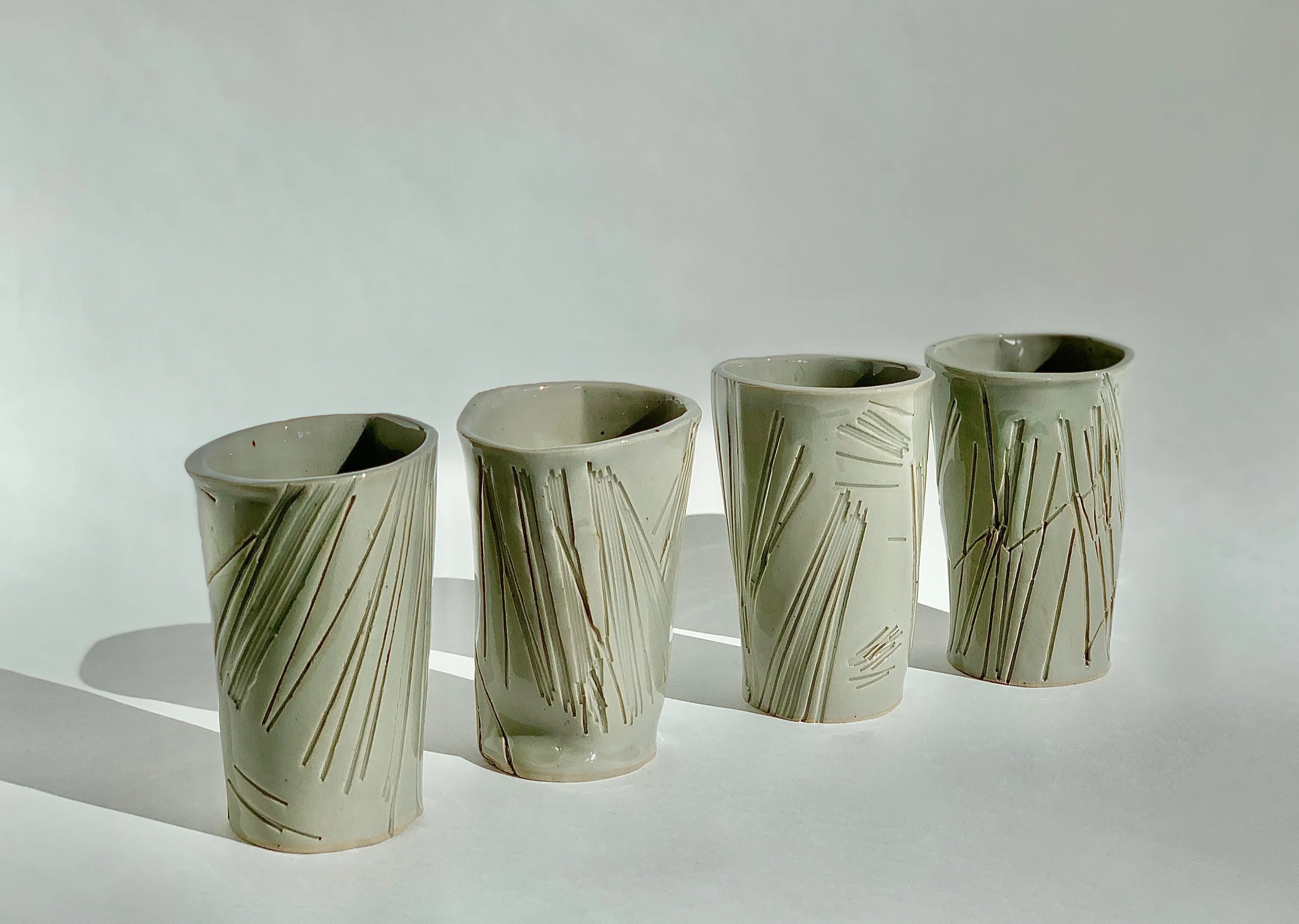 Incised Tumblers, Stoneware, incised linear pattern, celadon glaze, 2023